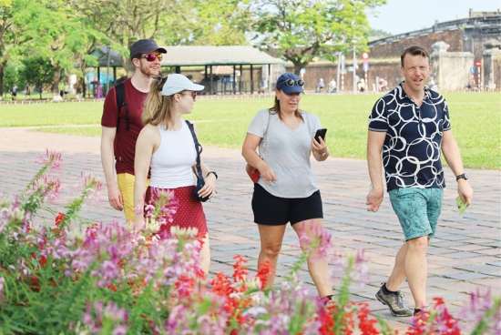 International visitors experiencing tourism in Hue